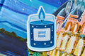 Blue candle sticker on colorful background