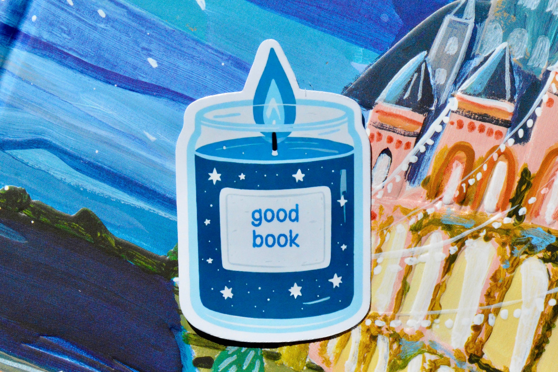 Blue candle sticker on colorful background