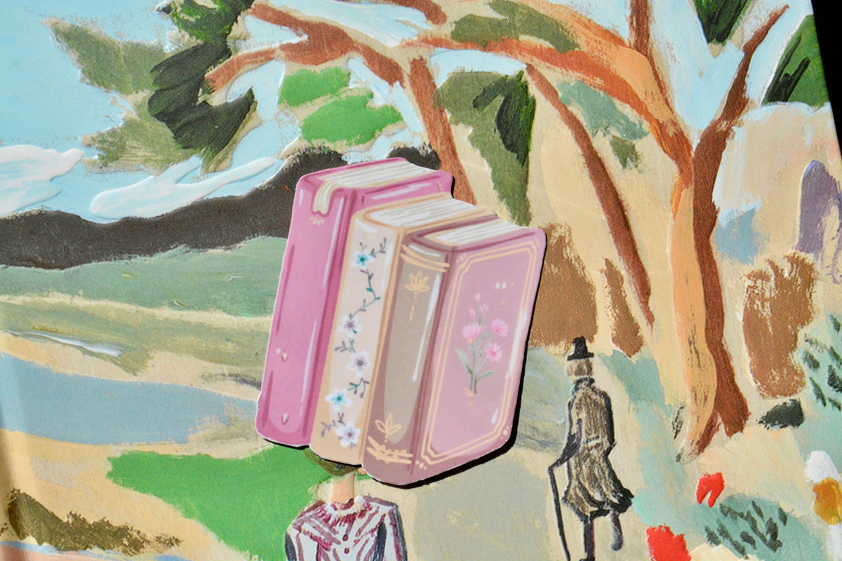book stack stickers showcased on a book