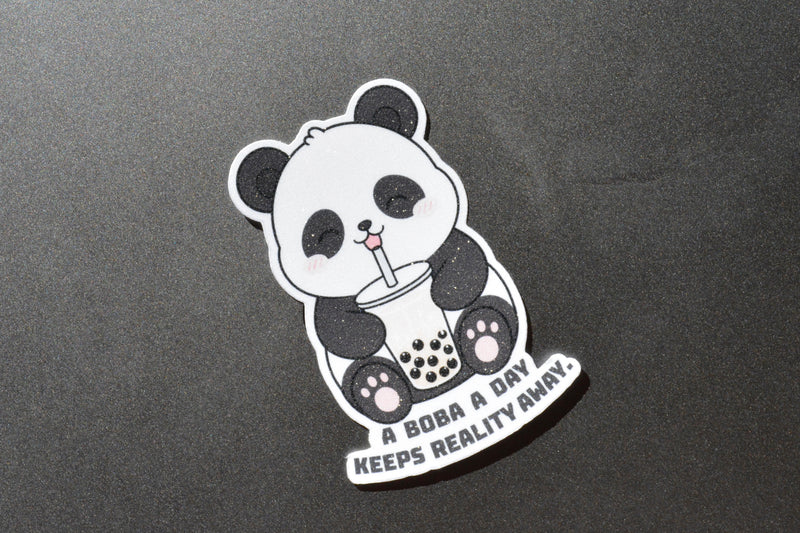 Happy panda on a sticker that says a boba a day keeps reality away