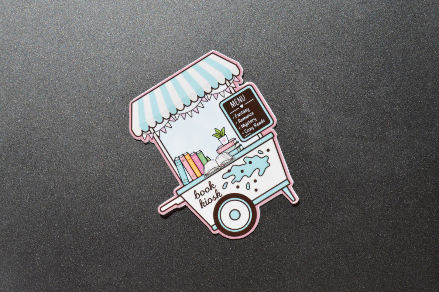 Book kiosk Waterproof Sticker showcased on Ipad
