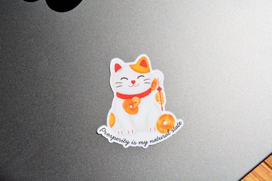 Lucky Cat Prosperity sticker is on laptop