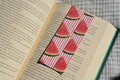 Double-sided linen bookmark featuring a watercolor watermelon pattern on premium linen cardstock.