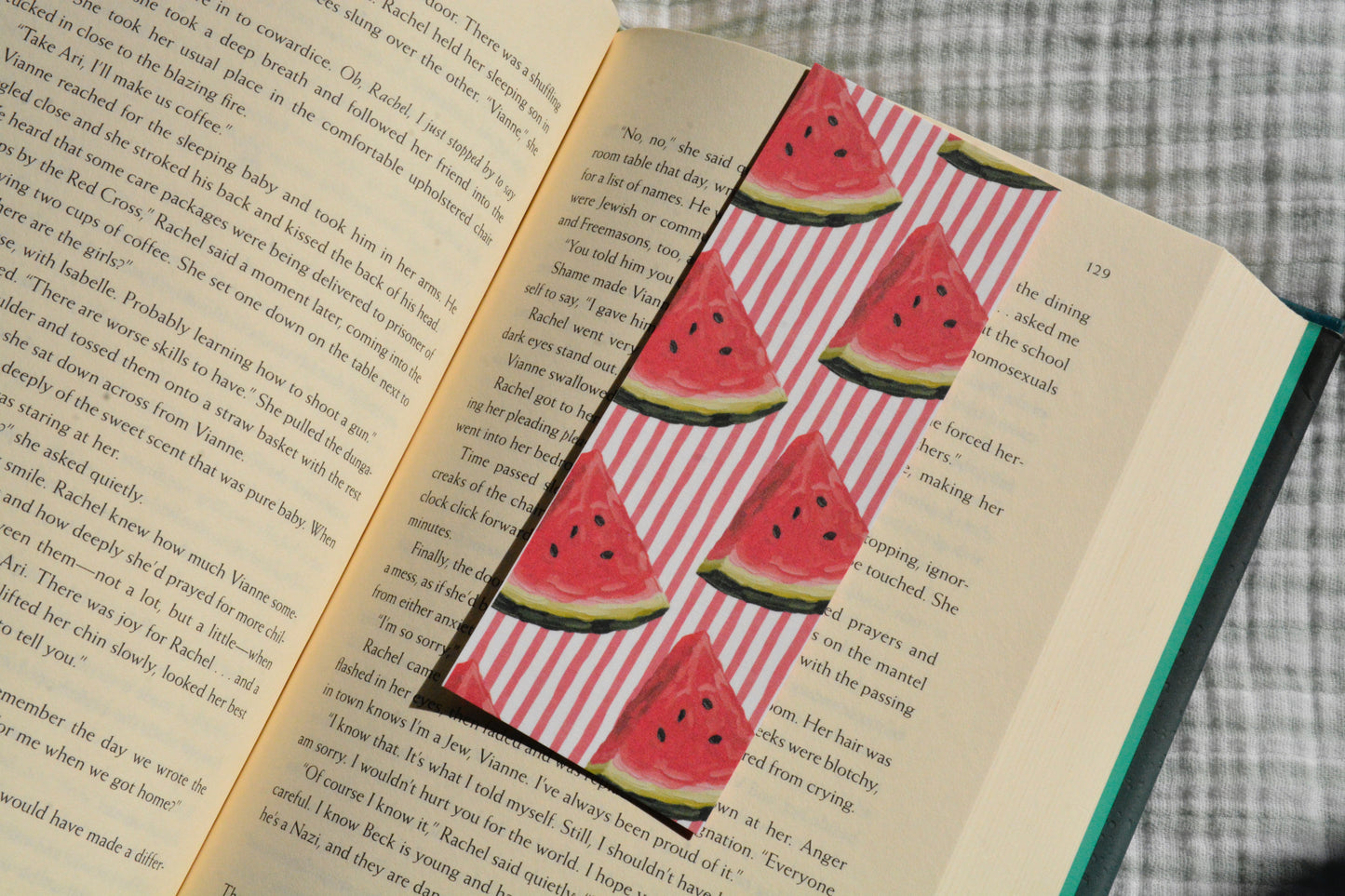 Double-sided linen bookmark featuring a watercolor watermelon pattern on premium linen cardstock.