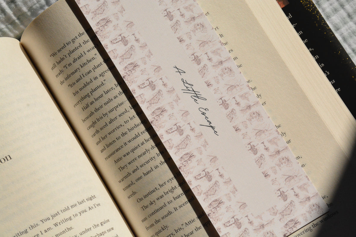 Double-sided handcrafted linen bookmark with a soft neutral toile design for book lovers.