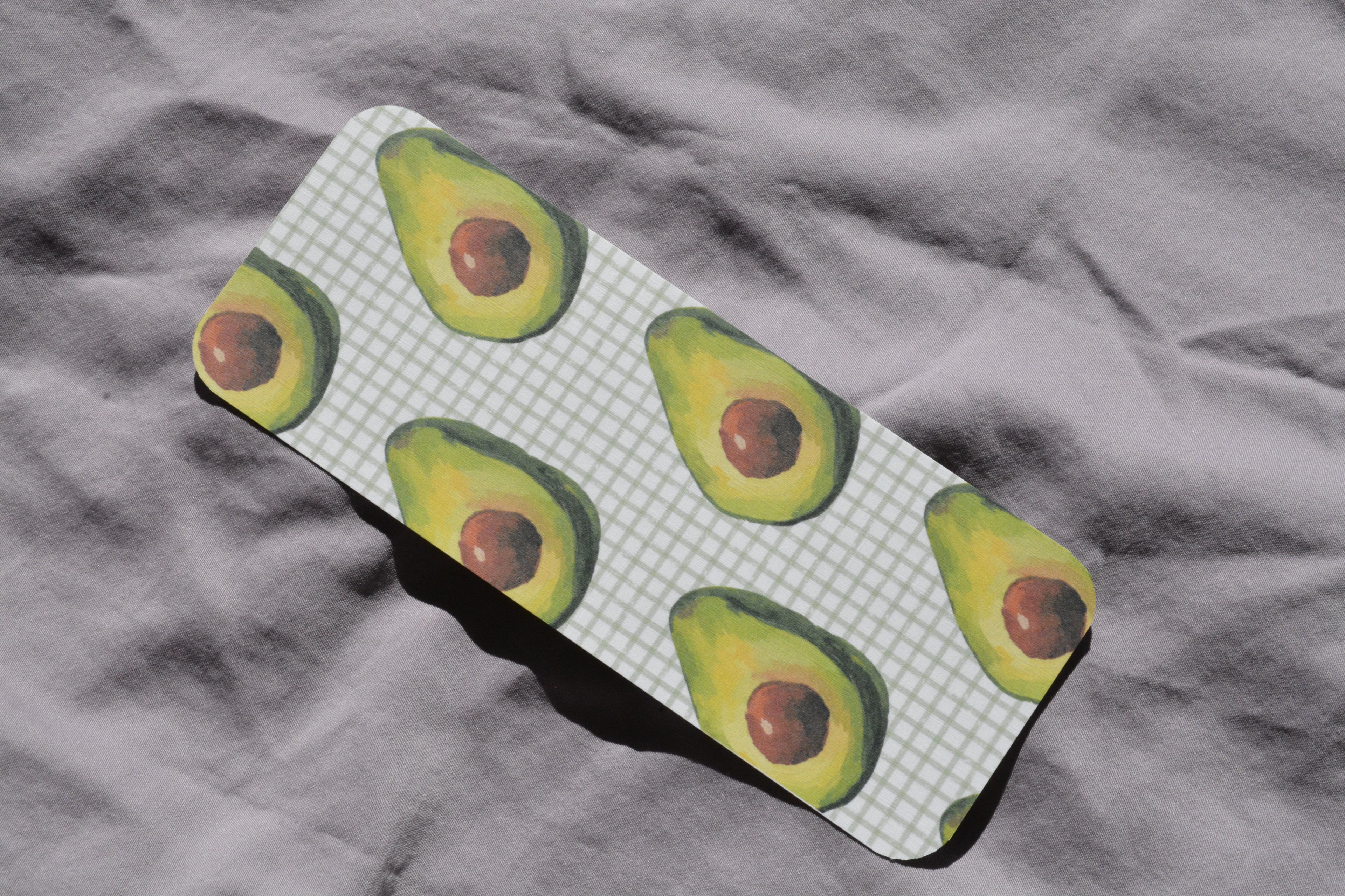 Rounded bookmark with avocados 