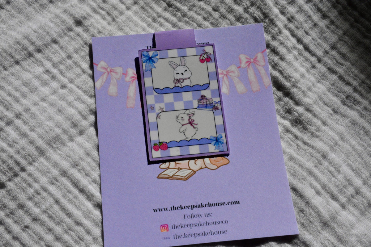 Handmade bunny magnetic bookmark with blue checkered design on a lavender Keepsake House backing card