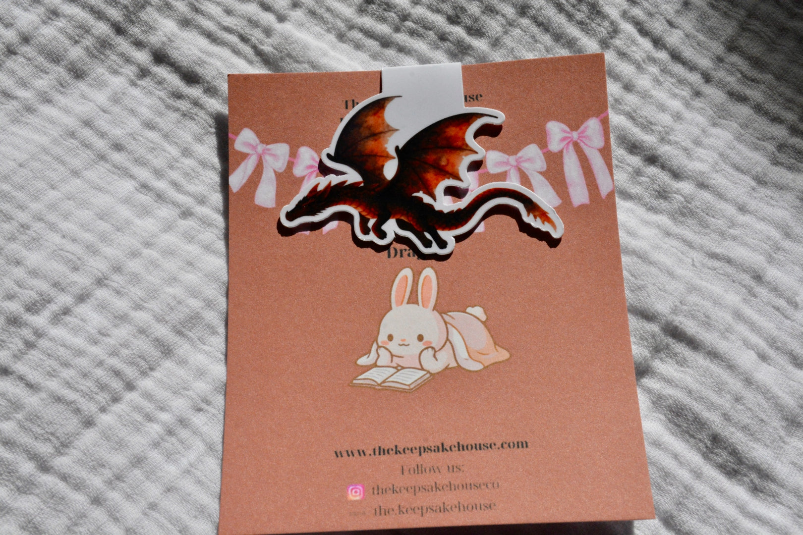 Handmade fiery dragon magnetic bookmark on a terracotta Keepsake House backing card