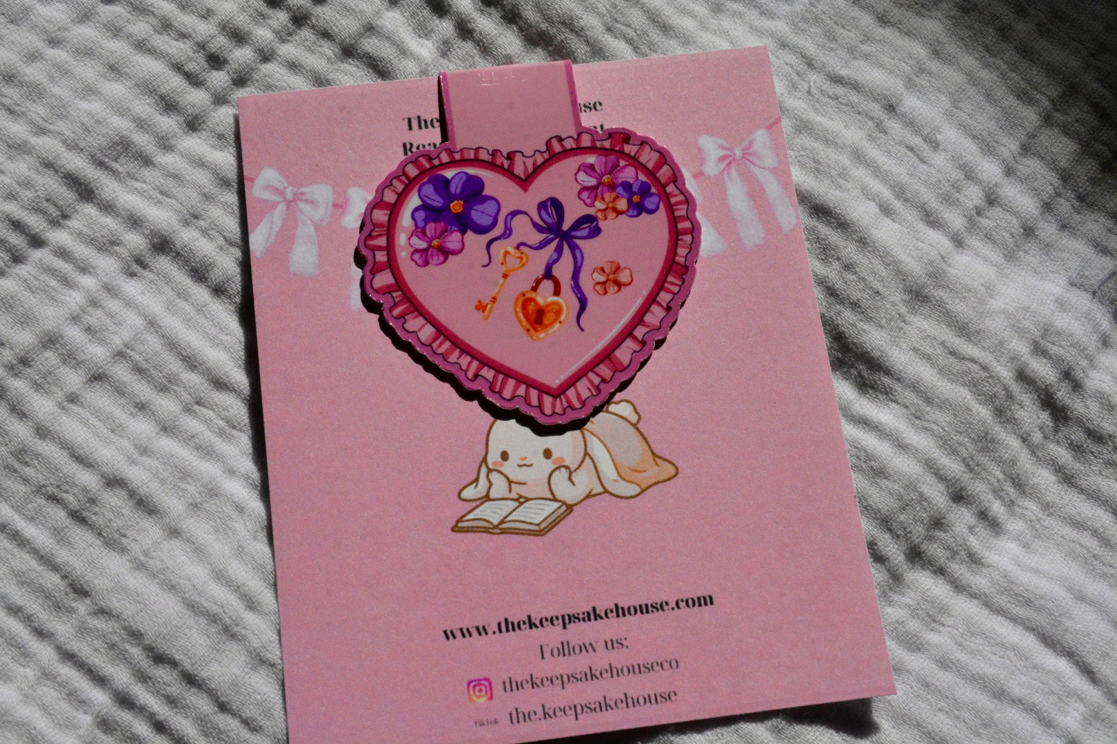 Handmade blooming heart magnetic bookmark with florals and ribbon on a pink Keepsake House backing card