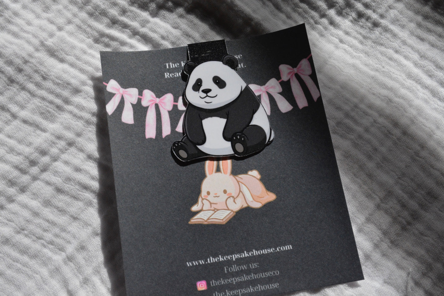 Handmade kawaii panda magnetic bookmark on a black Keepsake House backing card
