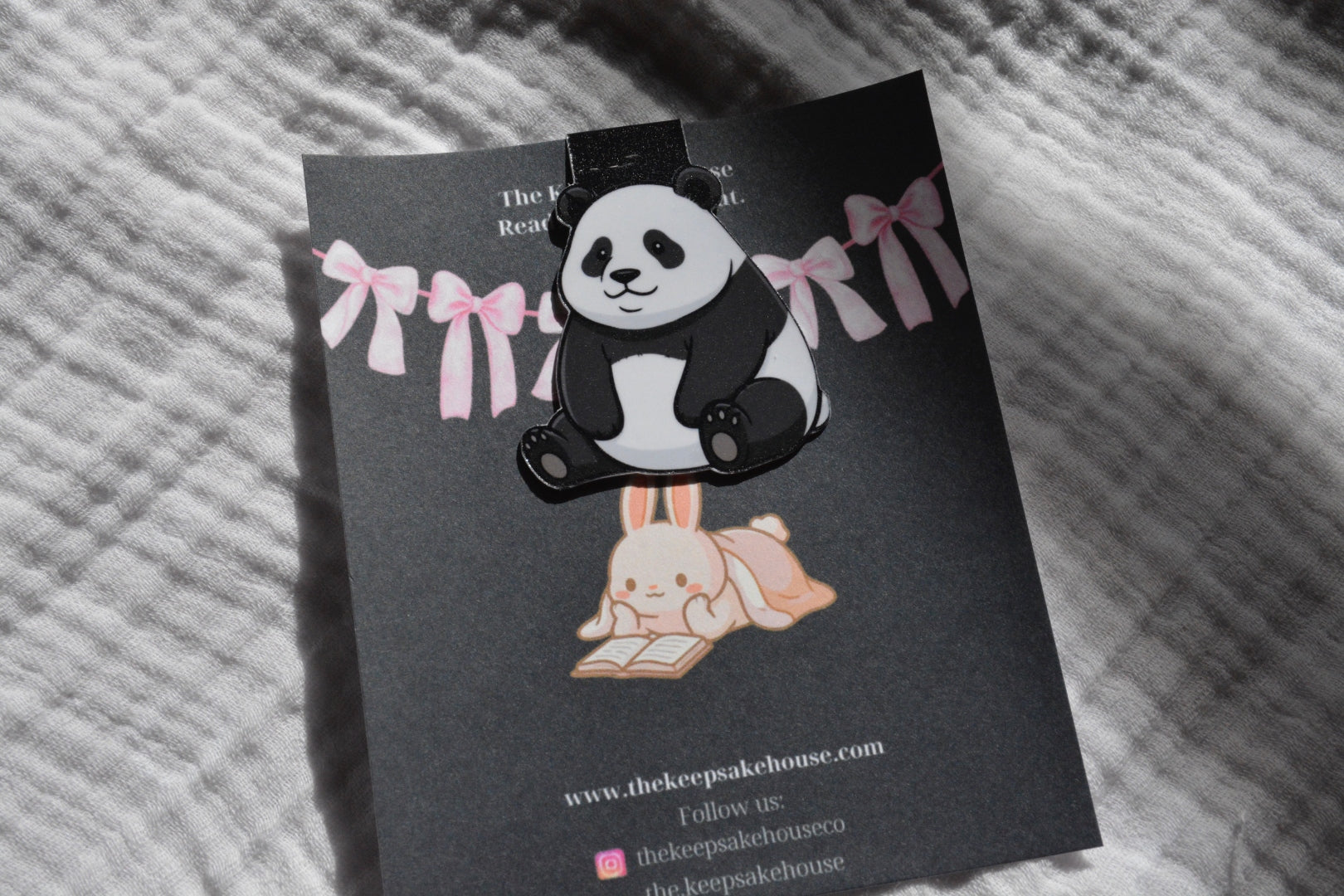 Handmade kawaii panda magnetic bookmark on a black Keepsake House backing card
