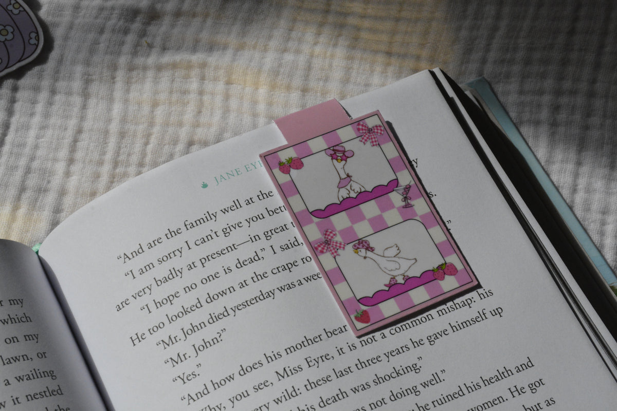 Handmade magnetic bookmark featuring a silly goose design on a pink Keepsake House backing card