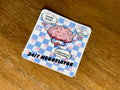 Funny "24/7 Negotiator" sticker featuring a cute cartoon brain with humorous parenting thoughts on a blue gingham background.