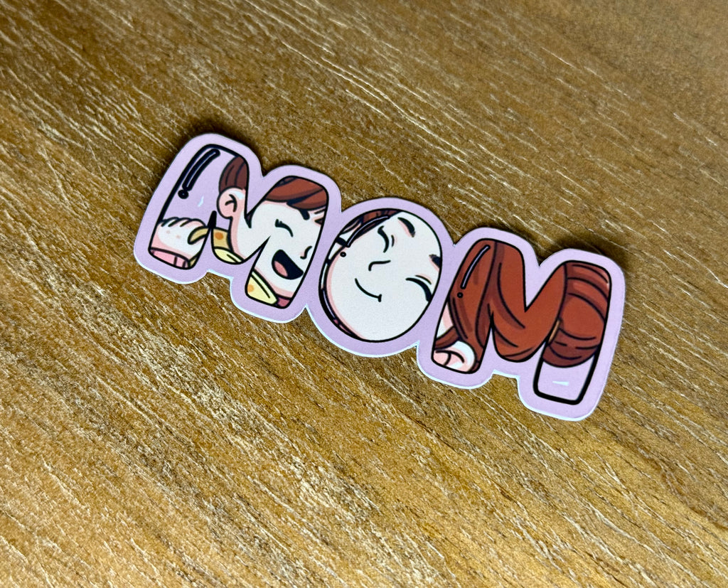Cute "Mom" sticker featuring the word "Mom" with a loving mother and baby illustration incorporated into the lettering and finished with a transparent laminate.