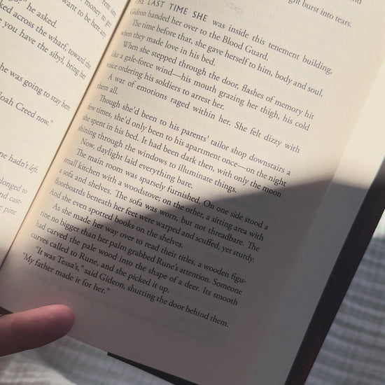 Video show casting stripped linen bookmark with the quote "never stop dreaming"