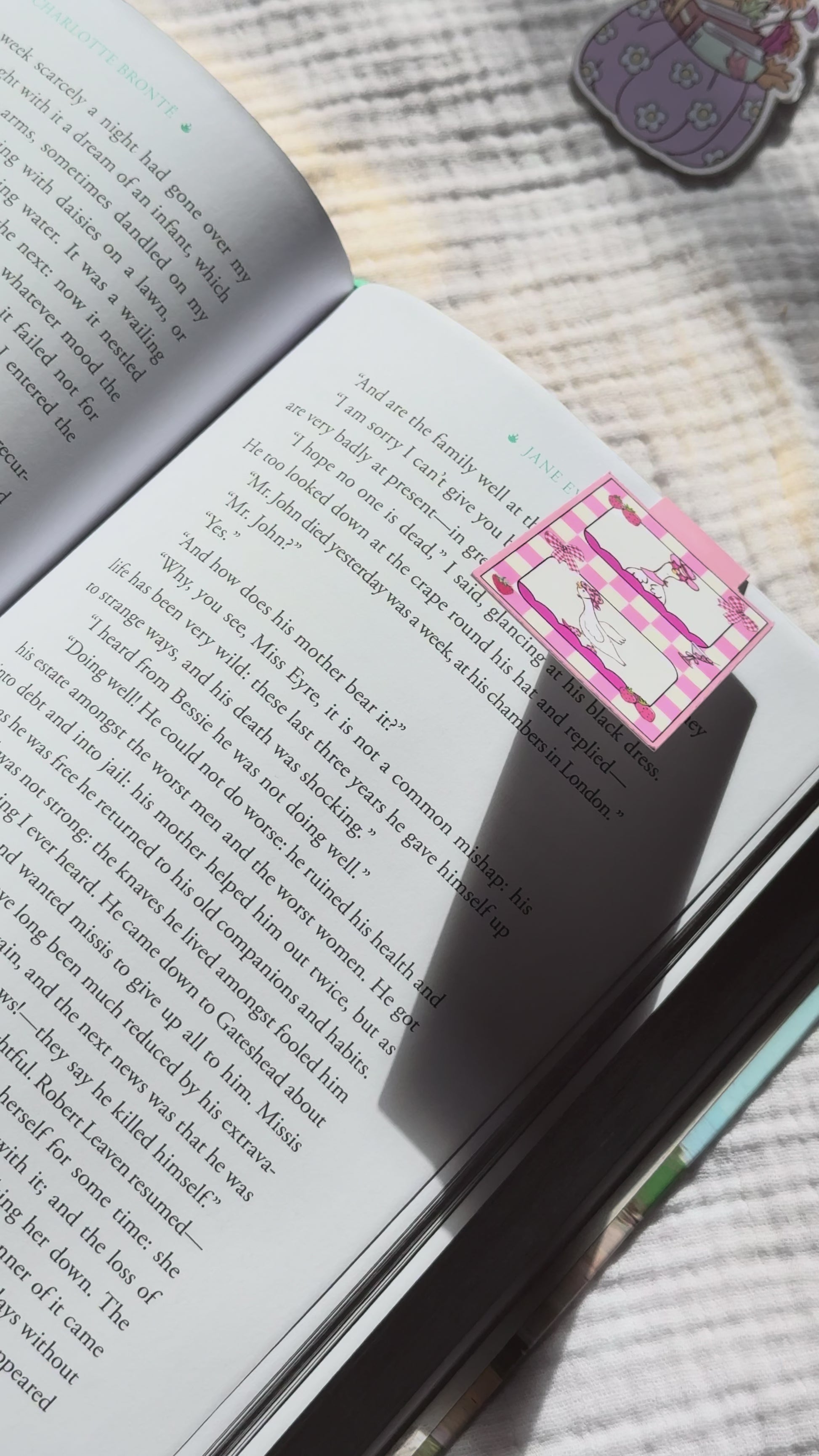 Silly goose magnetic bookmark demo: coquette pastel goose design clips securely onto book pages, shown on pink Keepsake House backing card with strong magnet