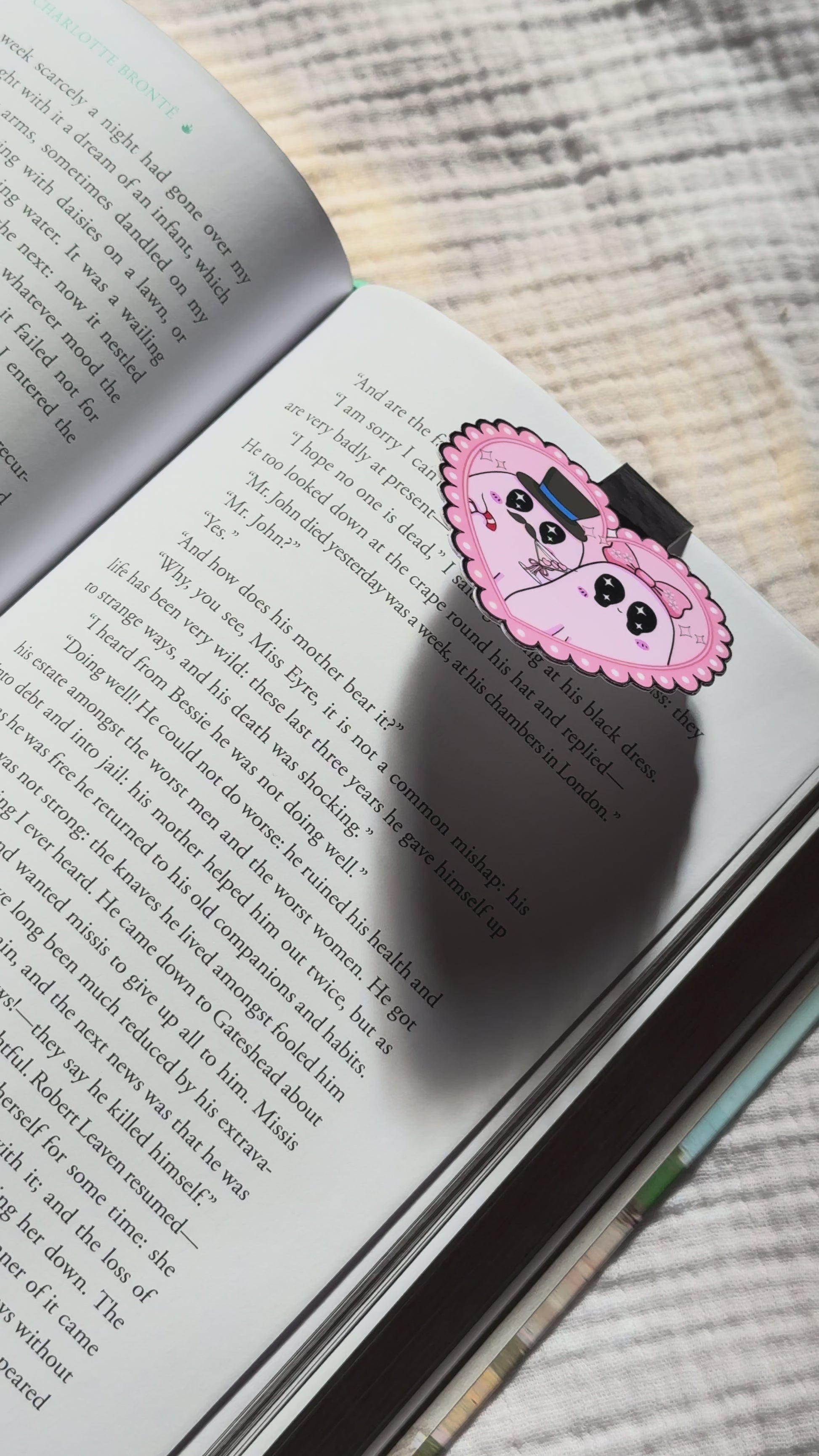 Magnetic bookmark showcased with ghost couple